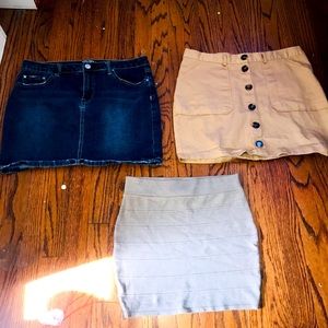 I am selling 3 skirts. I have a light brown, blue Jean and a brown button skirt!